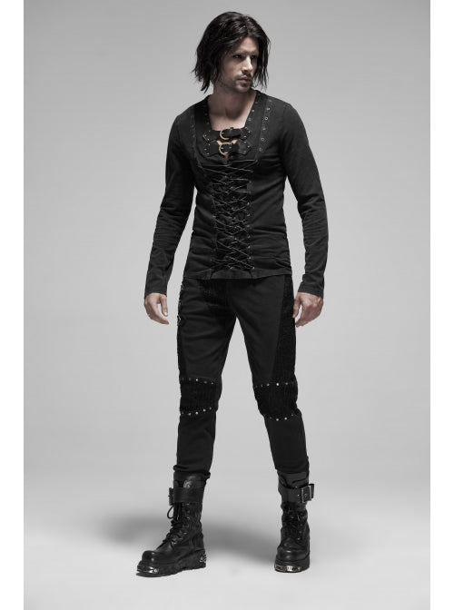 Netzstoff-Applikation am Knie mit silberfarbenen Nieten