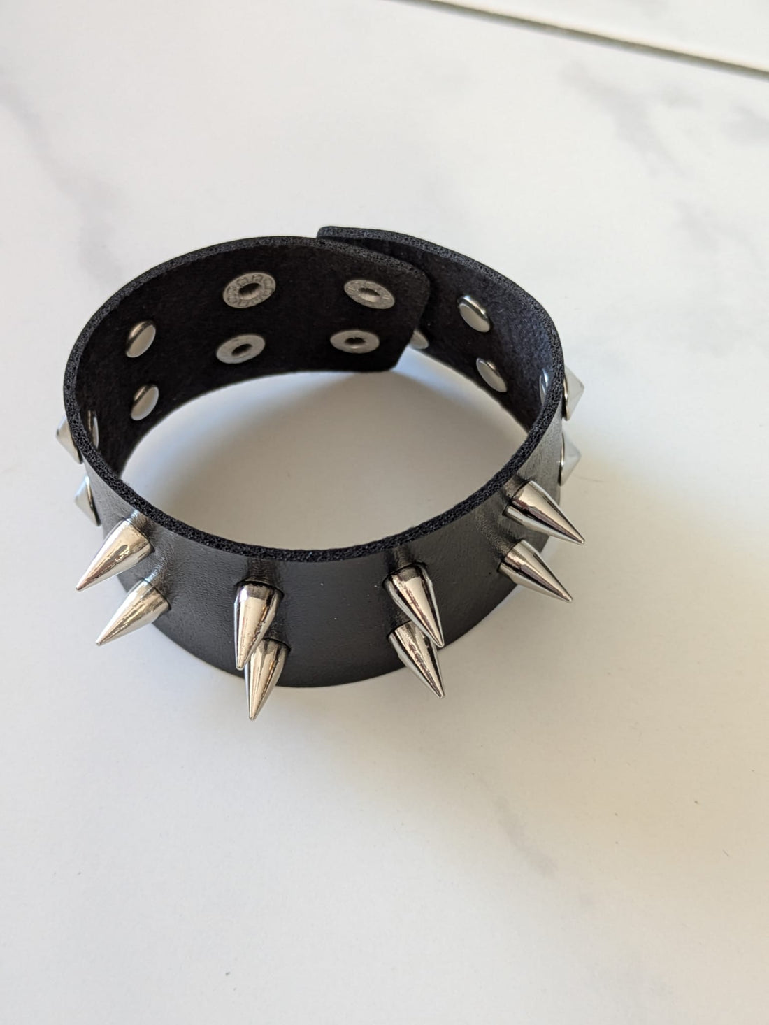 Wide faux leather bracelet with silver studs – adjustable, unisex punk accessory