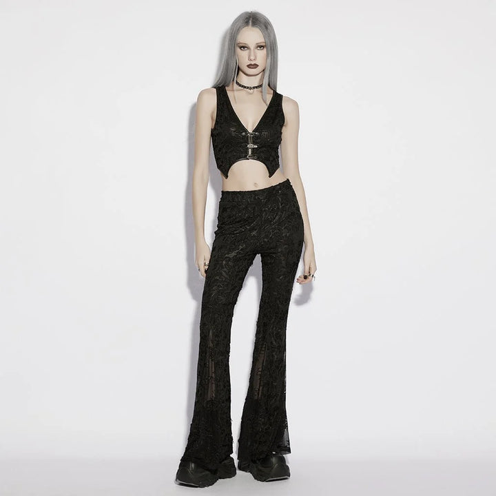 Detailaufnahme des strukturierten Jacquard-Stoffes und der drei Metallschnallen an der Vorderseite der Weste.